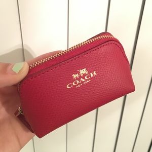 Tiny coach change/jewelry holder pocket